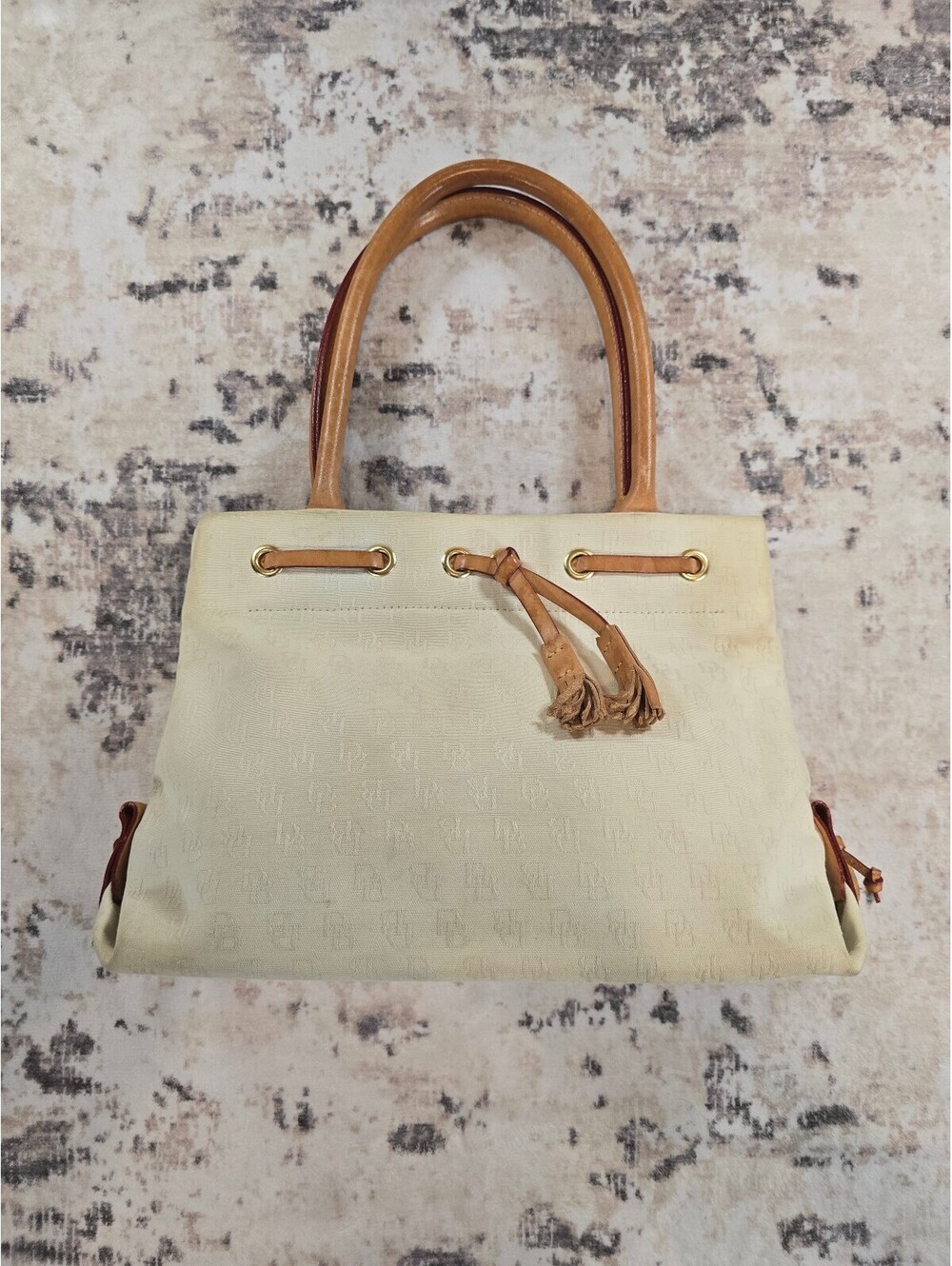 Dooney and Bourke cream monogram handbag